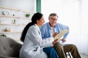 doctor asking senior patient health questions