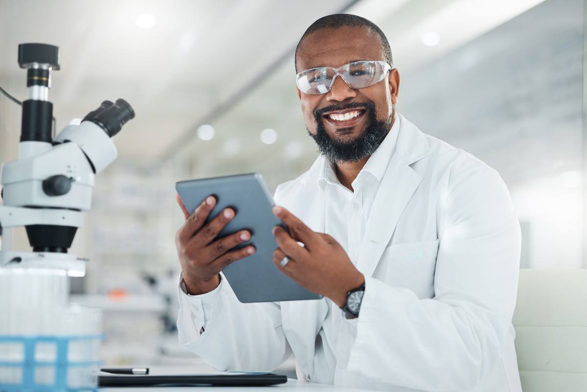 Researcher holding a tablet in the lab